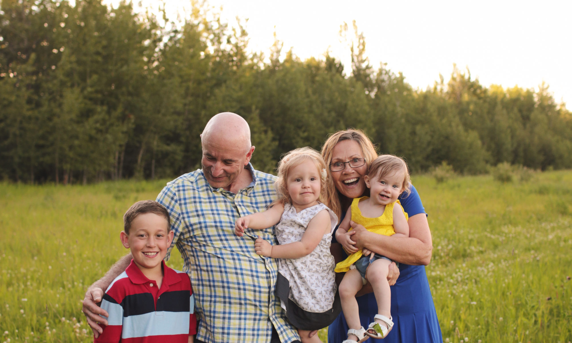 A picture of my husband and I with our 3 grandkids || This Essential Ingredient Makes Love Sustainable.